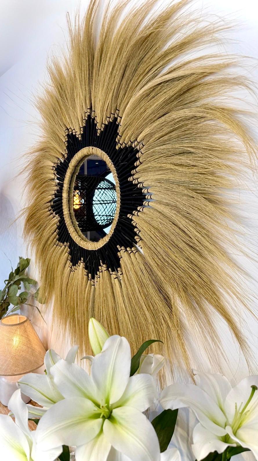 The Black Fluer Mirror